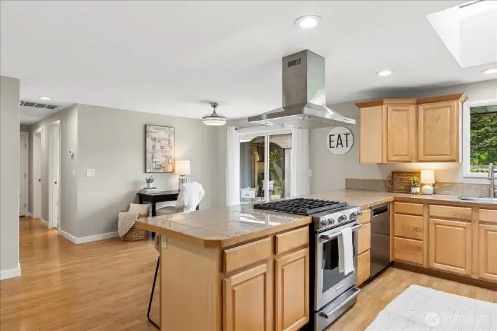 Convenient access to back yard just off the eat-in area of the kitchen.