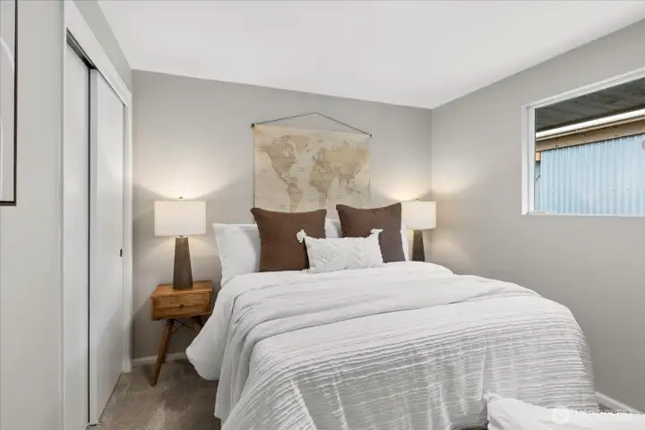 Guest bedroom #1 offers plenty of space for a queen size bed or potentially twin beds.