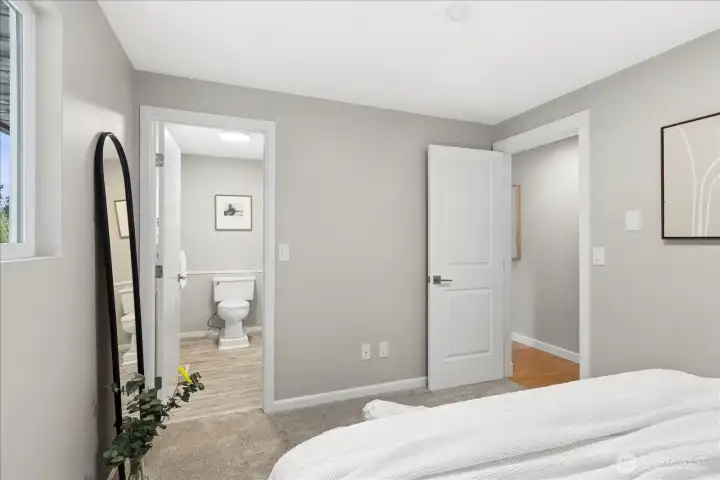 Guest bedroom #1 has private access to hall bath in main living space.