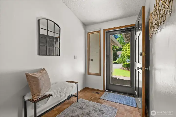 Welcome in! The storm door offers security with a view. Welcome in! The storm door offers security with a view.