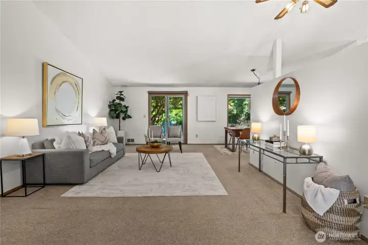 Step out to the back yard oasis through the glass sliding door. Step out to the back yard oasis through the glass sliding door.