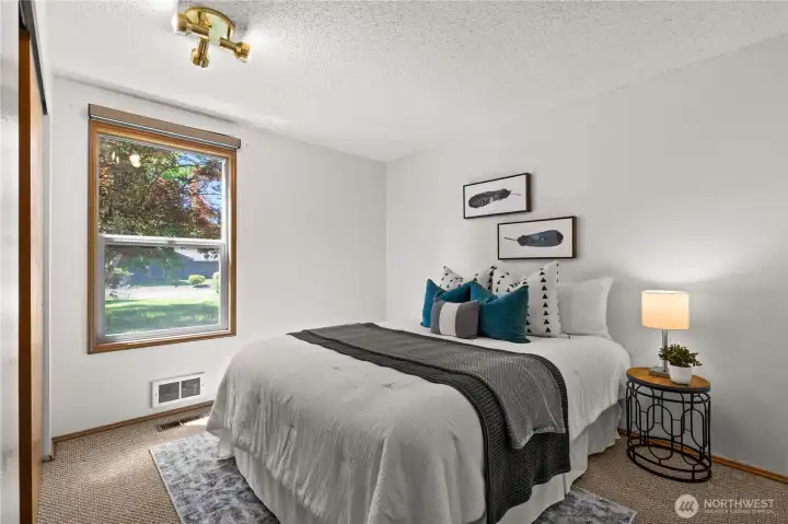 Bedroom #2 - quite spacious and includes remote control blinds. Bedroom #2 - quite spacious and includes remote control blinds.