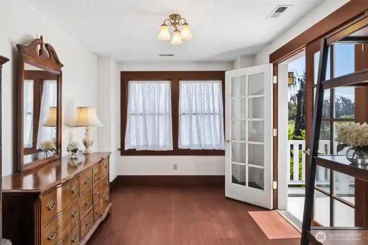 2nd seating space in the master with french doors to deck to the right.