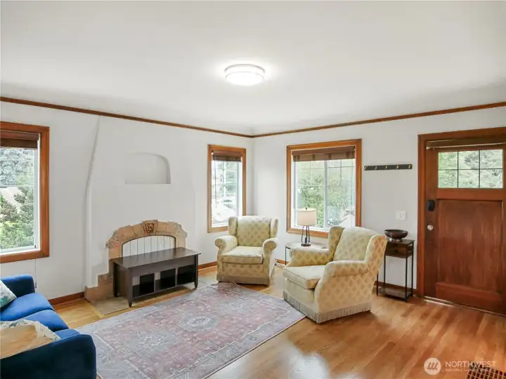 Hardwood floors, picture rail, and wood trim. Hardwood floors, picture rail, and wood trim.