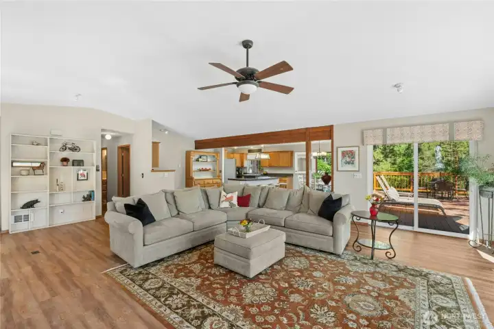 The heart of the home—an inviting great room that flows seamlessly into the kitchen, creating the perfect space for gathering and entertaining. The heart of the home—an inviting great room that flows seamlessly into the kitchen, creating the perfect space for gathering and entertaining.