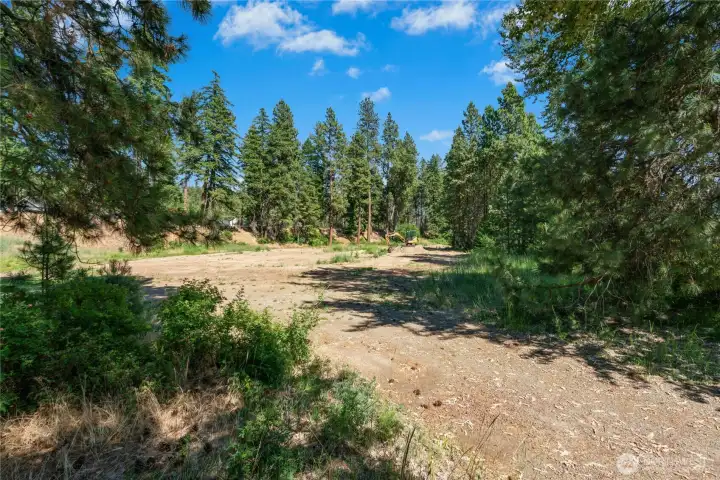 Additional acreage behind the home provides space to explore, enjoy, and imagine future possibilities. Additional acreage behind the home provides space to explore, enjoy, and imagine future possibilities.