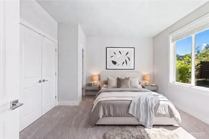 Virtual staged main level bedroom with ensuite bathroom. Virtual staged main level bedroom with ensuite bathroom.
