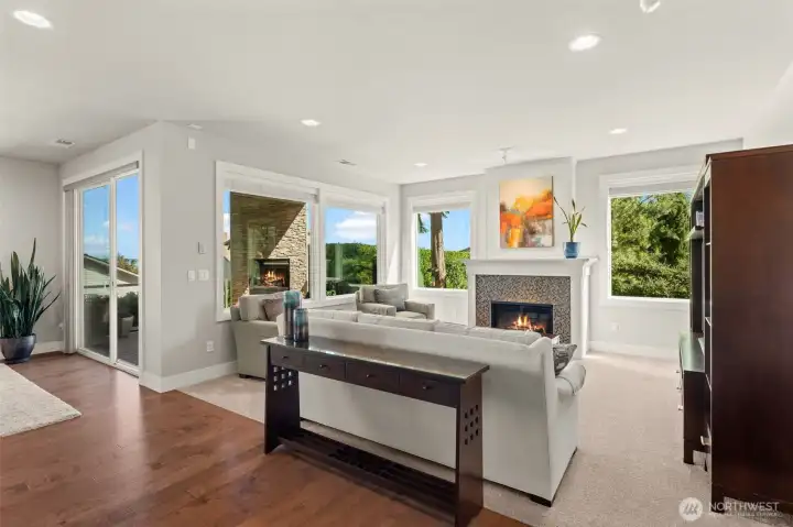 Thoughtfully designed living room connects seamlessly to the covered patio for year-round enjoyment. Thoughtfully designed living room connects seamlessly to the covered patio for year-round enjoyment.