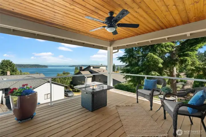 Covered deck combines panoramic water views with generous space for outdoor seating. Covered deck combines panoramic water views with generous space for outdoor seating.