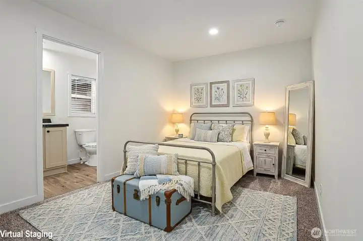 Virtually staged primary bedroom with en suite bath Virtually staged primary bedroom with en suite bath