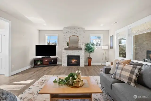 The fireplace is the focal point of the great room and adds warmth and detail to this comfortable space.