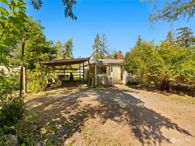 Front of House with Carport