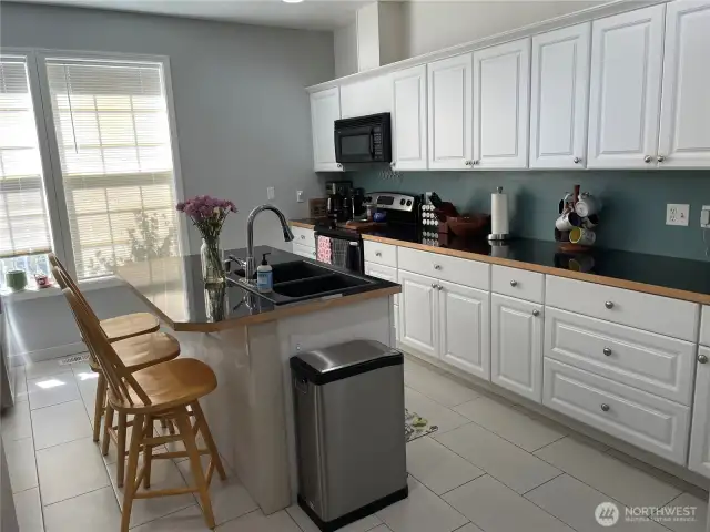 Kitchen entry to left of living room.