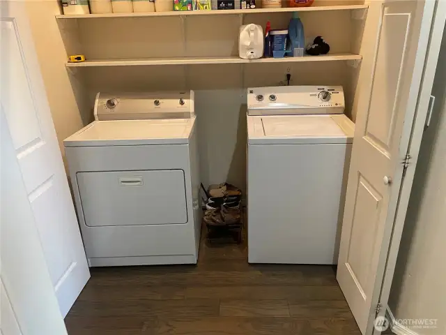 Laundry room with extra storage.