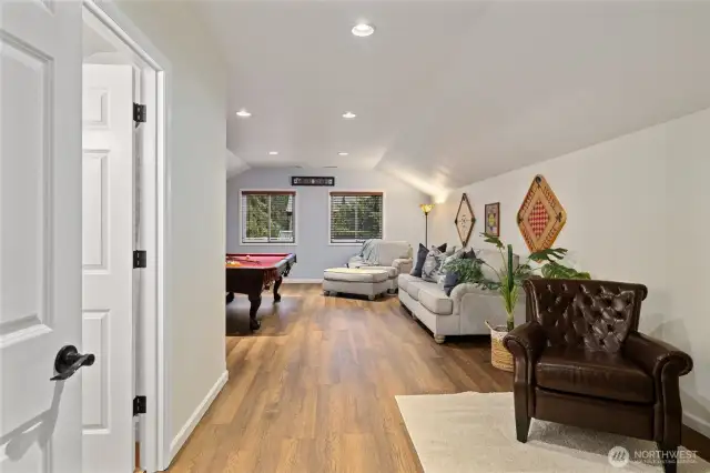 Game room upstairs with bathroom