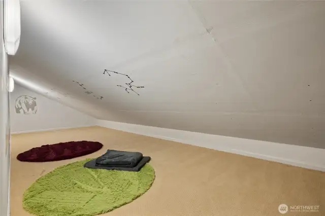 Two spacious nooks on either side of the game room for play/sleeping/storage area