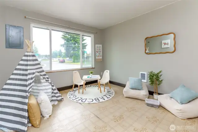Third bedroom, oversized and across from the utility room.