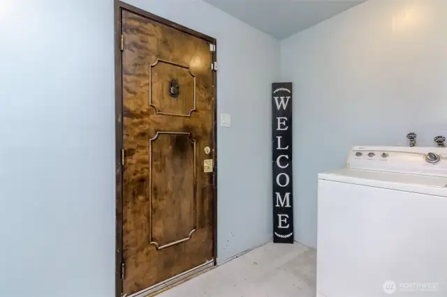 Another angle of the other side of the utility room and backdoor to the yard.