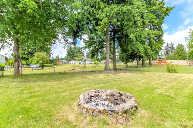 Backyard fire pit for summer nights and smore fun!