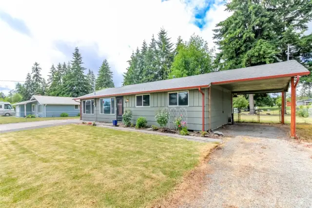 Spacious carport and extra guest parking here as well.
