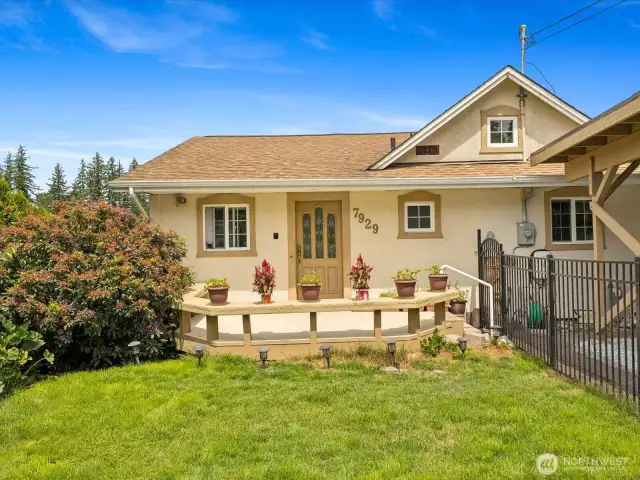 Nice Front Yard is fully fenced for gardening & pets.