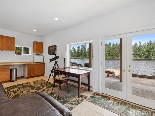 Lowest level Great Room with built-in counter & cabinets - with Door out to Patio, Backyard &  Dock - Welcome to the Lake!