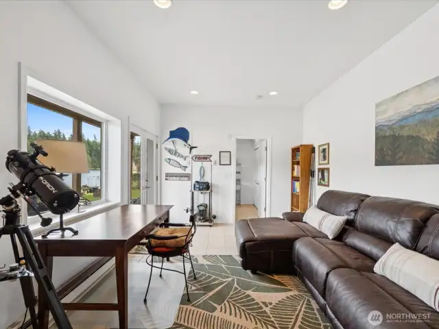 Lowest level Great Room with built-in counter & cabinets - with Door out to Patio, Backyard &  Dock - Welcome to the Lake!