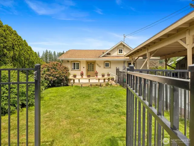Front yard is fully fenced - with 2 entry Gates.