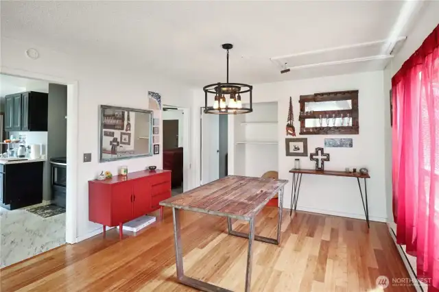 Generously sized dining area easily accommodates gatherings, with space to host  comfortably.