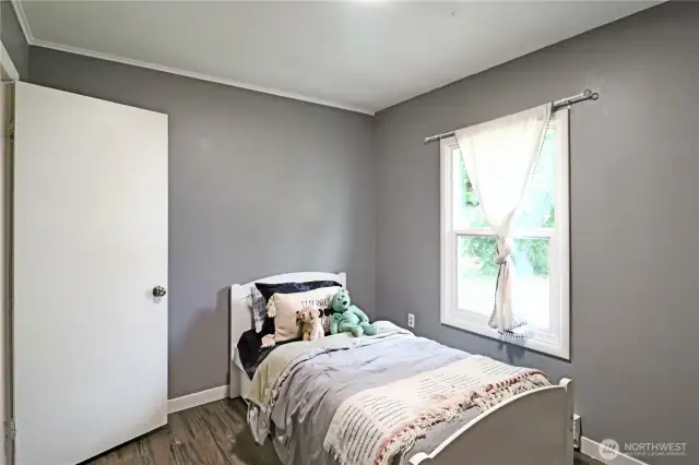 Versatile fourth bedroom—ideal for a nursery, creative studio, or extra storage.