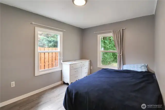 Well-sized guest room with easy access to the full bath.