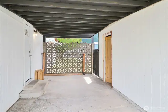 Spacious covered patio is perfect for outdoor dining or unwinding year-round.