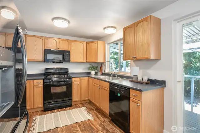 Newer sink & faucet, new lighting, gas stove