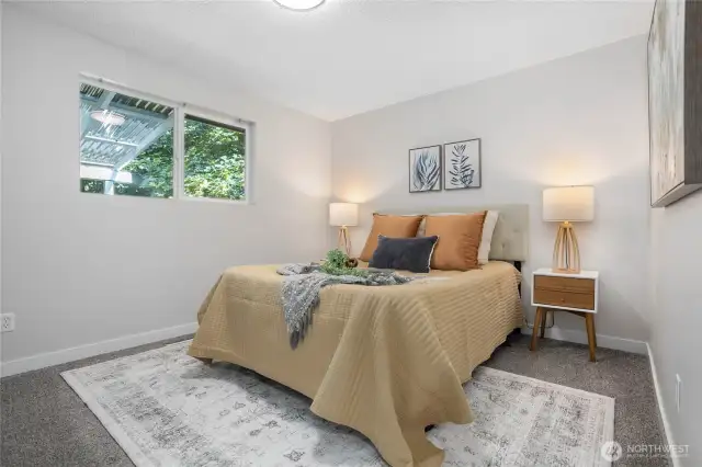 Owner's suite on upper floor shares access to full bath