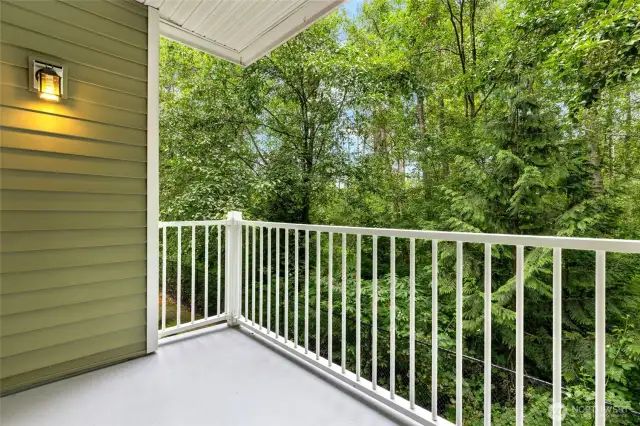 Backing to a nature preserve, you can enjoy serenity & privacy in your covered patio.