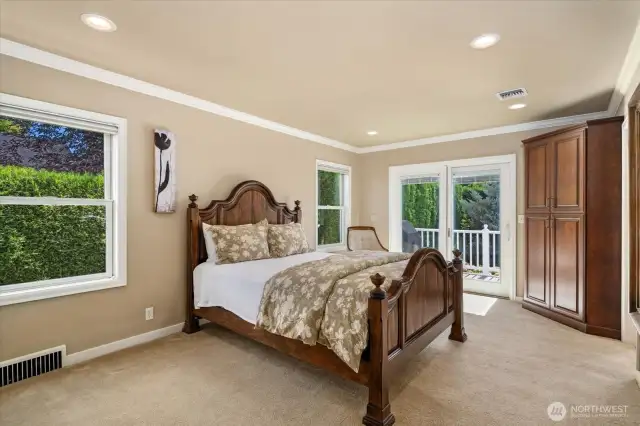 Primary suite is an addition with private french doors to deck