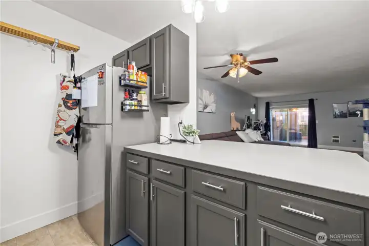 Enjoy the convenience of a well-designed kitchen with stainless steel appliances, a functional layout, and a window view that brings in brightness as you take care of daily tasks.
