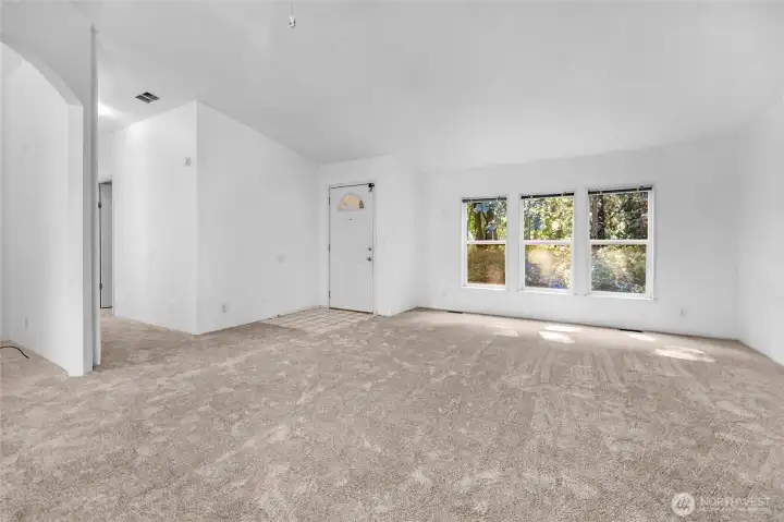 Vaulted Living and Dining rooms…