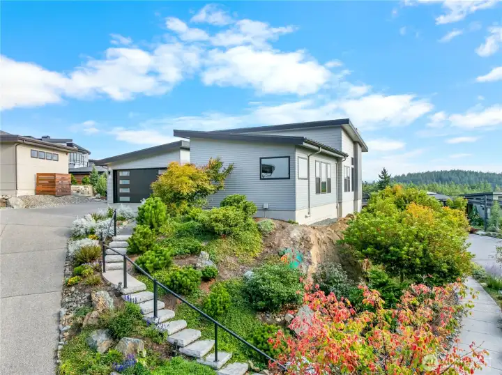 Stairs for easy access and style leading up from the road.