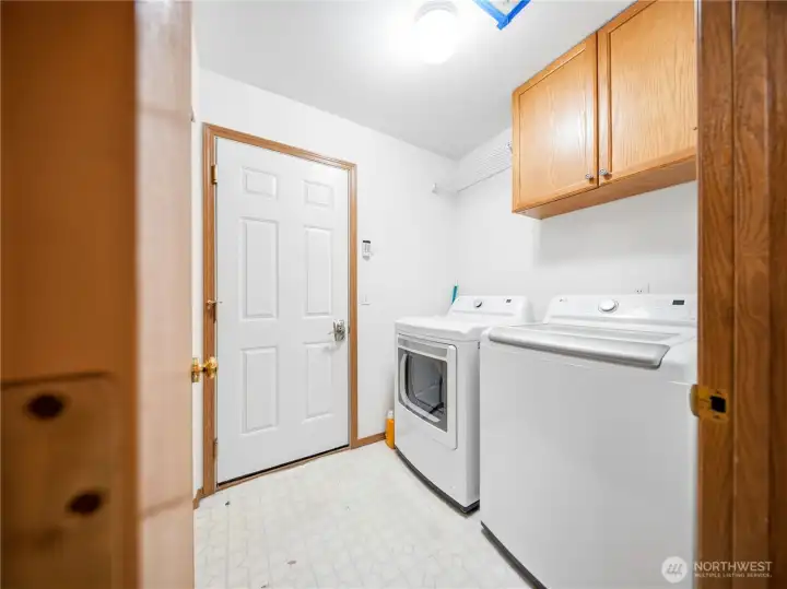 Laundry room off family room and door to garage