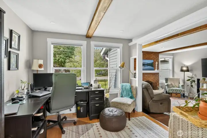 A flex space just off the living room make a great office for them. It would also make a perfect tv room or den. Many uses for this space.