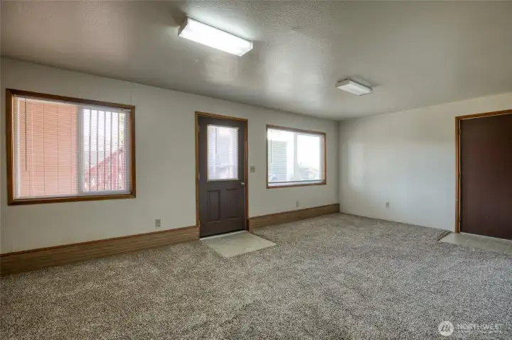 Garage entrance to the right.