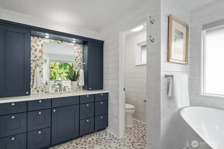 Beautifully updated primary bath with soaking tub