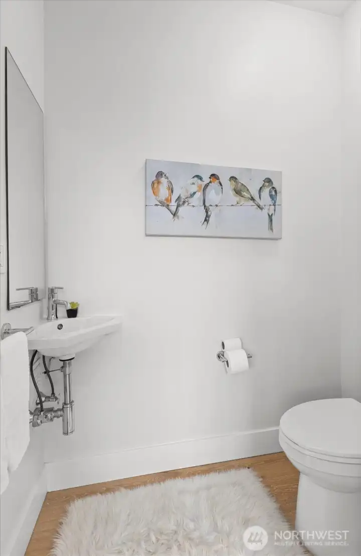 Half bath on the main level for convenience.