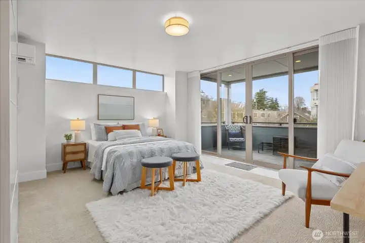 Plenty of room in the primary suite for a King bed.  Large balcony for west facing outdoor enjoyment.