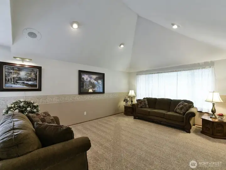 Vaulted ceilings. Recessed lighting. Like new carpets.