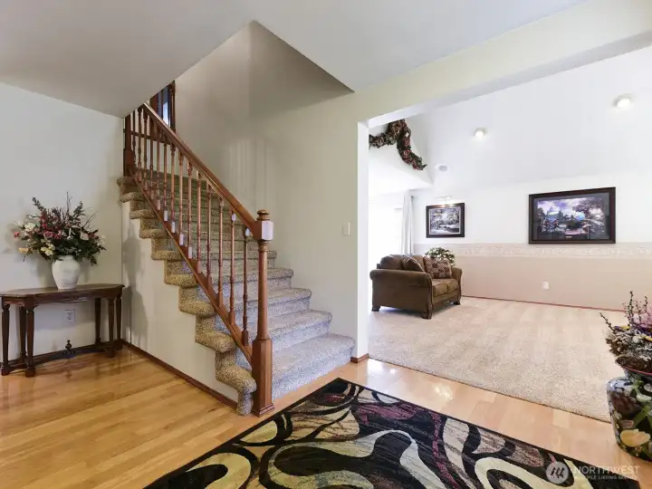 Hardwood floors and beautiful staircase Greeting you to this home.