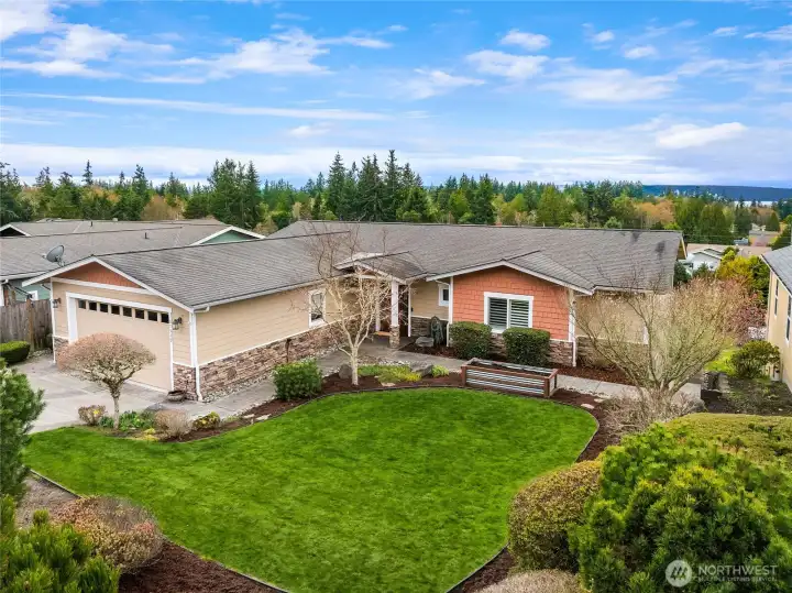 A custom-built pacific northwest style home with panoramic views of the Olympic Mountains and Hood Canal.