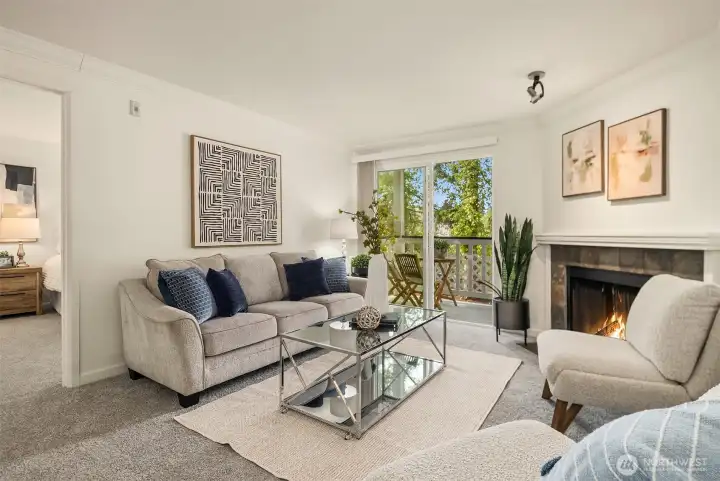 Living area perspective highlighting the natural light and the primary suite entrance on the left