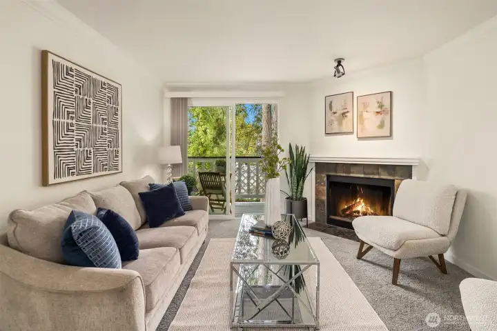 Another view of the living room, highlighting the bright, comfortable layout